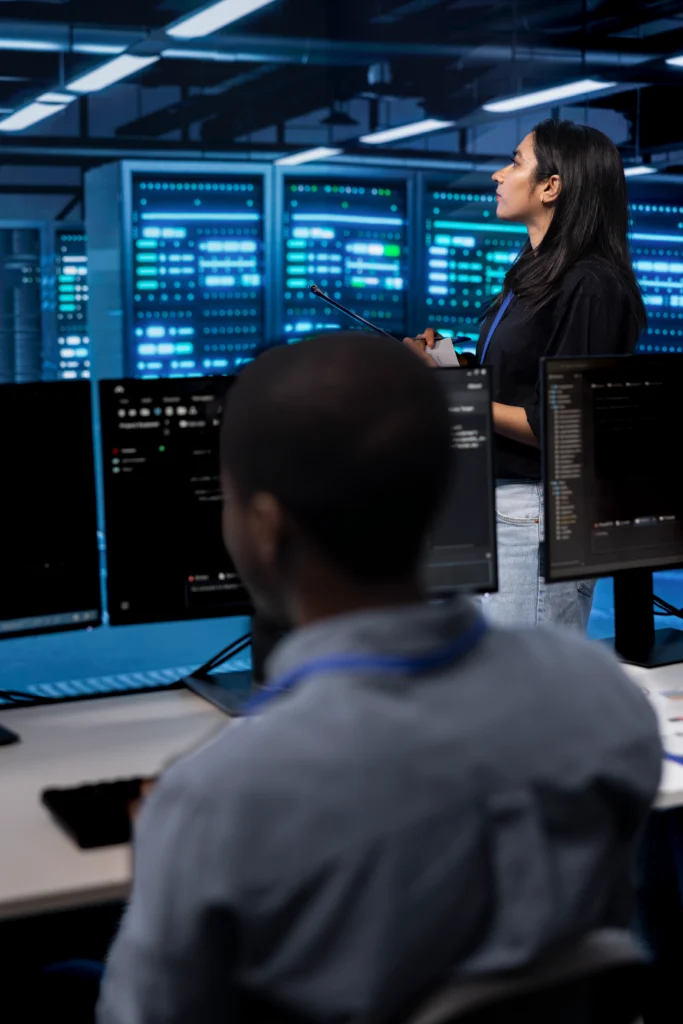 “Modern data centre interior layout server racks in hot-aisle/cold-aisle configuration”