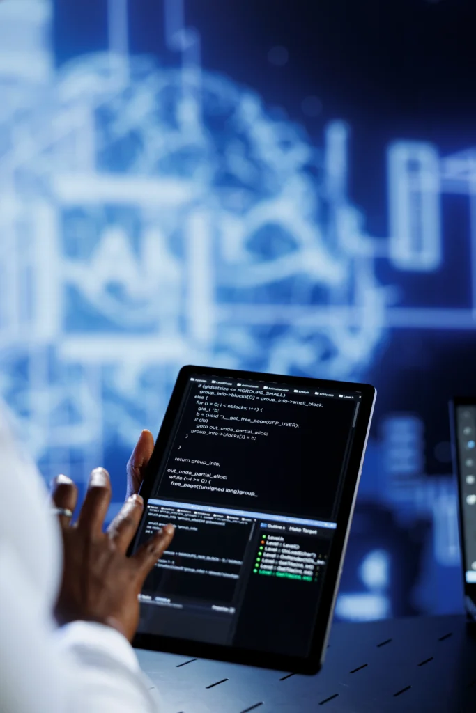 “Developer laptop showing code connecting to AI API endpoint integrating AI into web application”