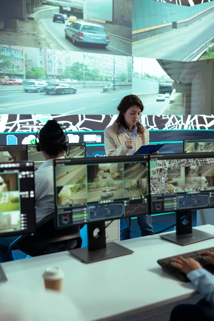“Security operations center monitor displaying multiple CCTV camera feeds from NVR system”