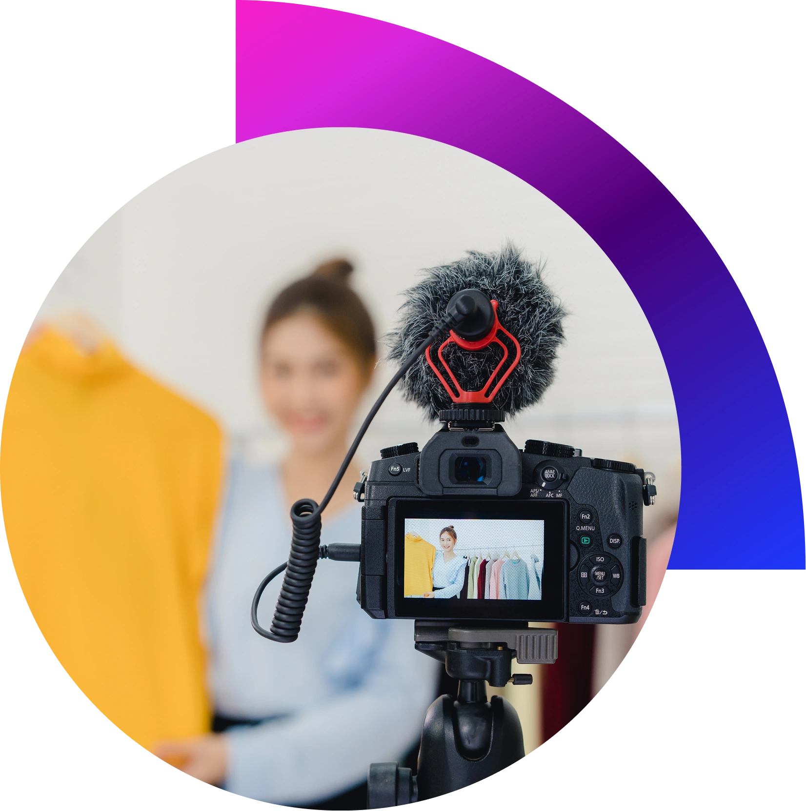 “Videographer filming brand promotional video with studio lighting and creative props in Dubai.”