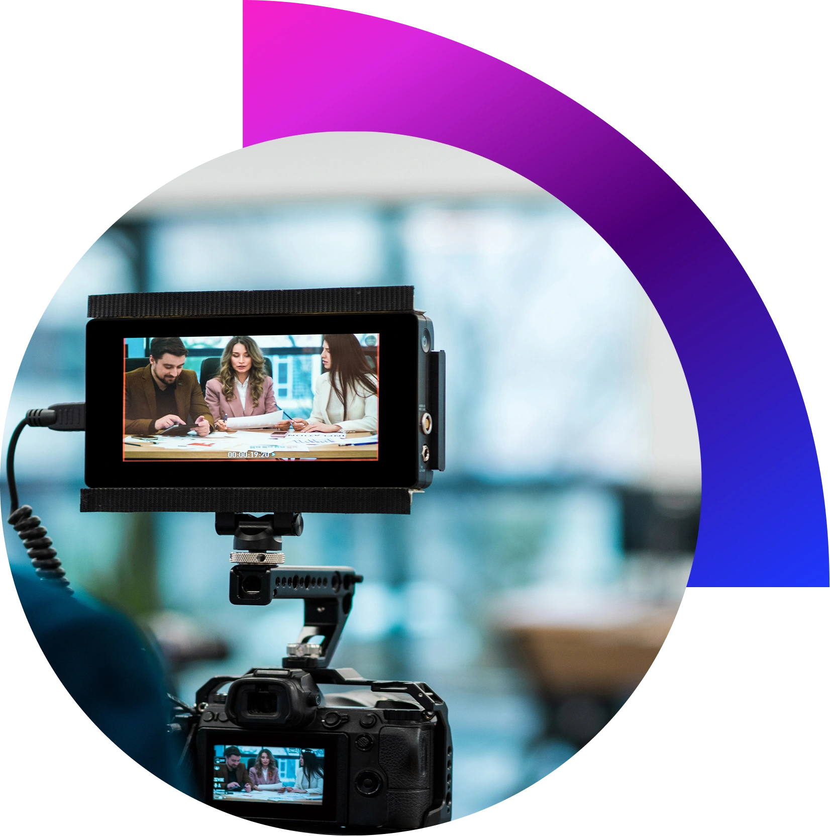 “Videographer filming corporate brand video in Dubai office with professional camera and lighting setup”