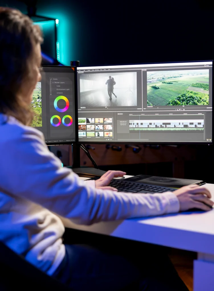 “CGI video production team creating visual effects and 3D elements on professional editing software.”